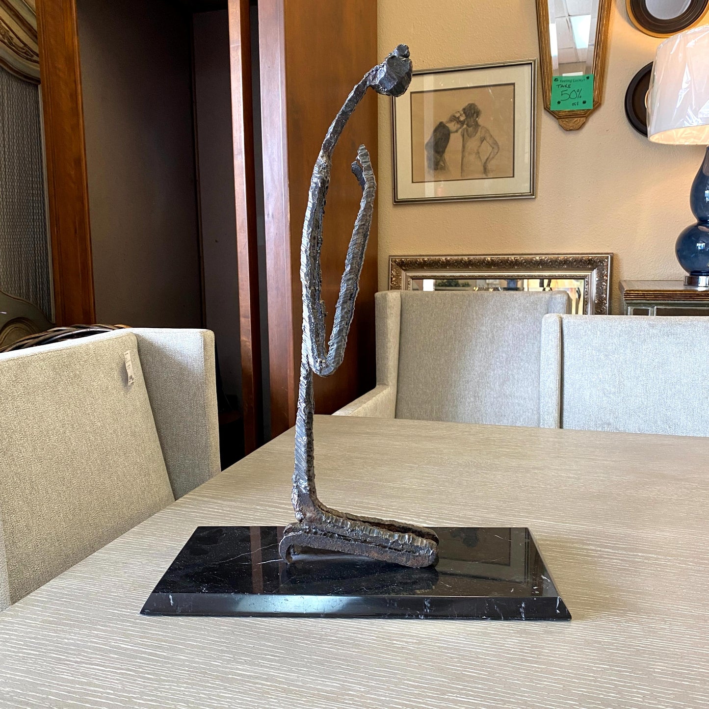 IRON KNEELING STATUE