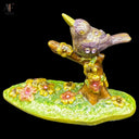 ENAMELED PERCHED BIRD