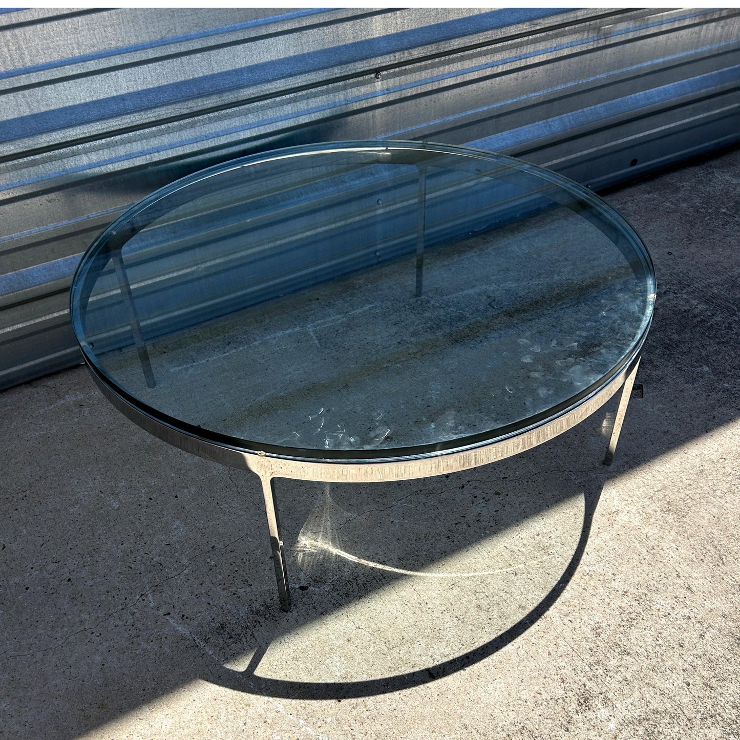 1970's Nicos Zographos Round Glass Coffee Table w/ Polished Stainless Steel Base