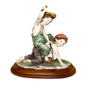 GORHAM BOYS PLAYING FIGURINE