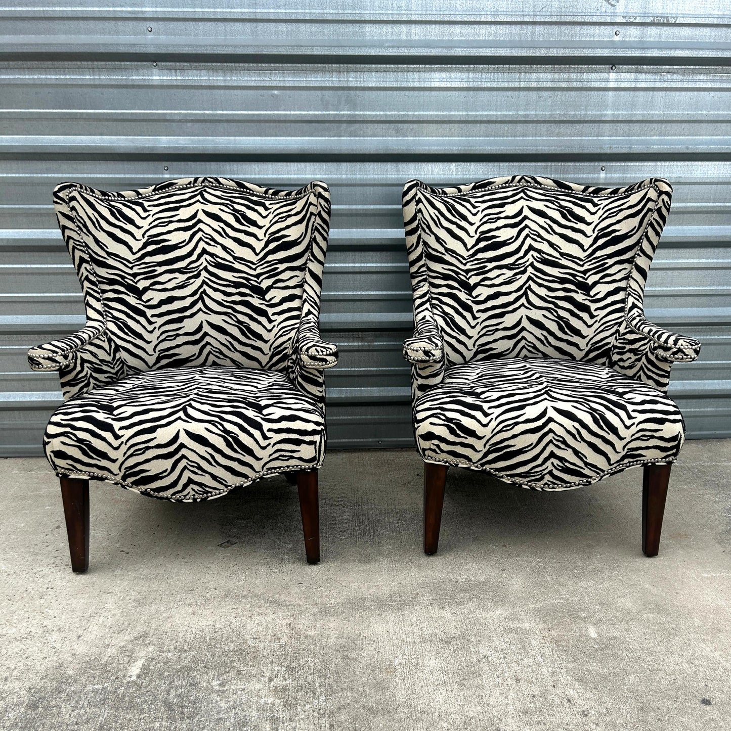 Pair of Zebra Wingback Chairs w/ Nailhead Accents