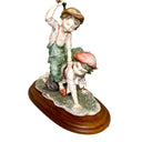 GORHAM BOYS PLAYING FIGURINE