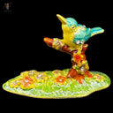 ENAMELED PERCHED BIRD