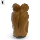 HAND-CARVED WOOD EMBRACING COUPLE SCULPTURE
