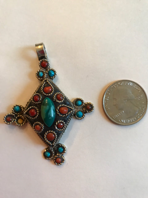 Silver coral and turquoise pendant made in Nepal