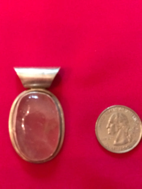 Silver and rose quartz pendant handmade in Nepal .925